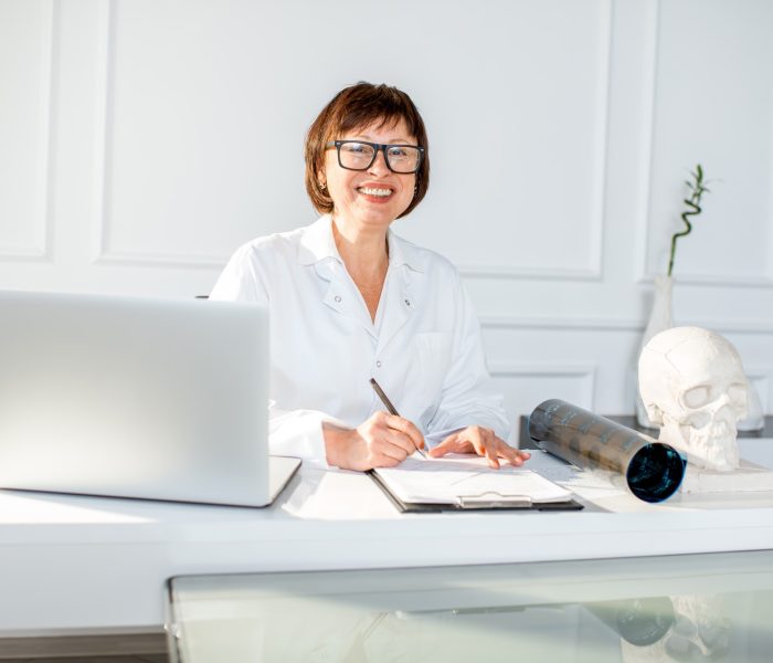 Senior woman doctor in the office